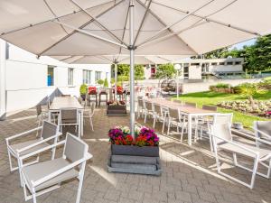 Restoran või mõni muu söögikoht majutusasutuses Novotel Suites Genève Aéroport