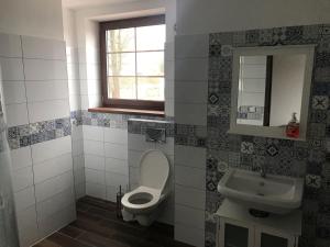 Koupelna v ubytování Portus Apartment + 28 fotografií