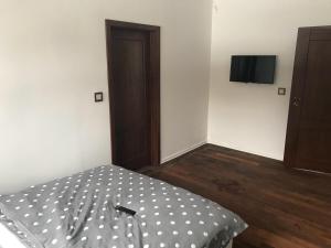 Postel nebo postele na pokoji v ubytování Portus Apartment