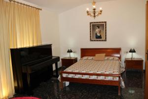 Postel nebo postele na pokoji v ubytování La Casa Del Pich CON GARAJE PARA DOS VEHÍCULOS