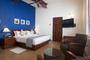 Voodi või voodid majutusasutuse Colombo Court Hotel & Spa toas
