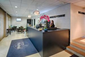 Vstupní hala nebo recepce v ubytování Triple M Hotel