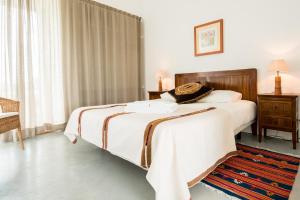 Postel nebo postele na pokoji v ubytování Monte Da Azarujinha