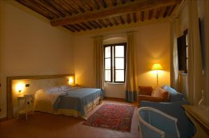 מיטה או מיטות בחדר ב-Le Vecchie Cantine