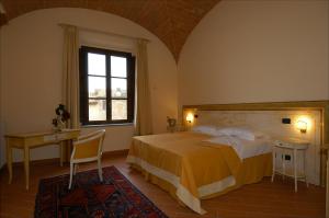 Letto o letti in una camera di Le Vecchie Cantine
