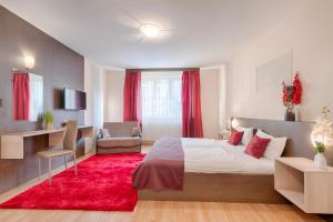 Posteľ alebo postele v izbe v ubytovaní Triple M Hotel
