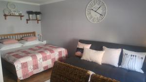 Postel nebo postele na pokoji v ubytování Apartamenty no3