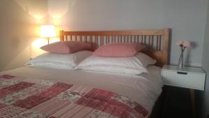 Postel nebo postele na pokoji v ubytování Apartamenty no3