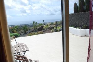 A balcony or terrace at Luxury studio, sea view, pool