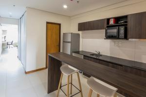 Eldhús eða eldhúskrókur á Asuncion Rent Suites Centro