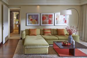 a living room with a couch and a table at Mandarin Oriental Miami in Miami