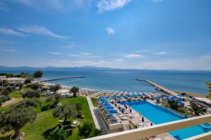 an aerial view of a resort with a swimming pool at Palmariva Beach Hotel in Eretria