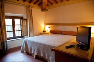 Letto o letti in una camera di Le Vecchie Cantine