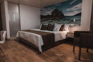 Voodi või voodid majutusasutuse HOTEl PACHAMAMA SPA toas
