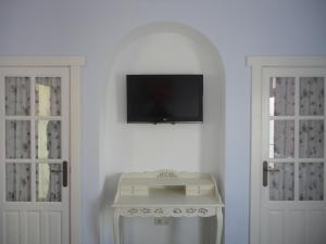 TV a/nebo společenská místnost v ubytování Hotel Rural las Cinco Ranas