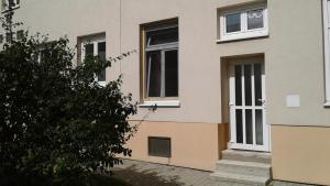 Budova, kde se apartmán nachází + 1 fotografie