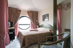 Postel nebo postele na pokoji v ubytování Hotel Kyrton
