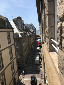 a view of a city street from a building at Appartement de charme in Saint Malo