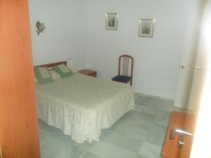 Posteľ alebo postele v izbe v ubytovaní Hostal Centro Sol
