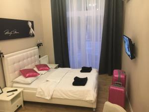 Posteľ alebo postele v izbe v ubytovaní Apart Promenada Gwiazd