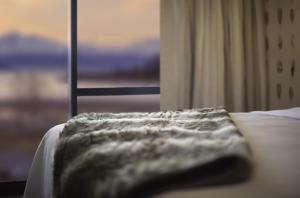 Postel nebo postele na pokoji v ubytování Ranginui At Lake Tekapo
