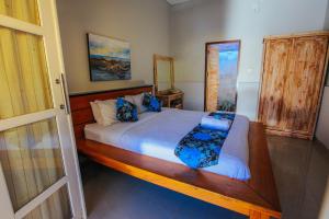Ein Bett oder Betten in einem Zimmer der Unterkunft Villa Matahari