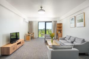 TV a/nebo společenská místnost v ubytování Nalagi Hotel