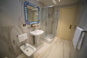 Koupelna v ubytování Hotel Goya