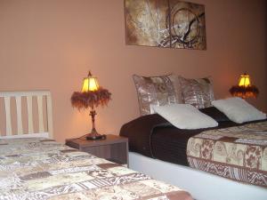 A bed or beds in a room at VILLA SINGOLA -SOLE-LUNA-Casavilladusoleil
