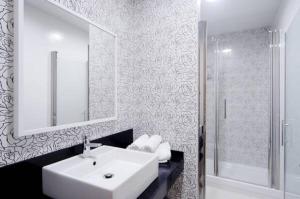 Koupelna v ubytování Aparthotel Rambla108