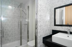 Koupelna v ubytování Aparthotel Rambla108