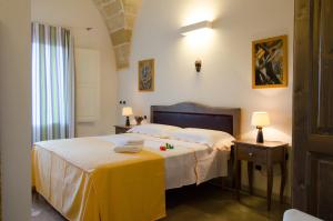 Ένα ή περισσότερα κρεβάτια σε δωμάτιο στο Trulli Altomare