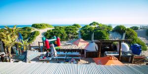 a view of a water park on a beach at Pili Pili Beach Cabanas in Sedgefield