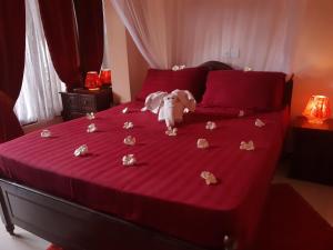 Postel nebo postele na pokoji v ubytování Sri Lancashire Guest House