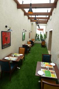 Restoran või mõni muu söögikoht majutusasutuses Lemon Tree Hotel Coimbatore