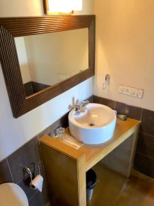 A bathroom at The Bungalows Light House, Goa by Leisure Hotels