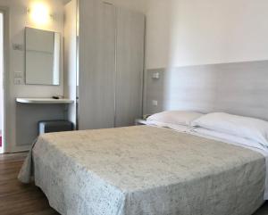 Letto o letti in una camera di Hotel Nelson