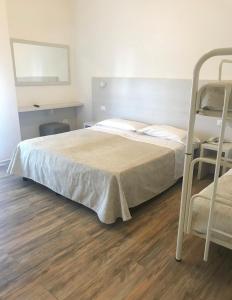 Letto o letti in una camera di Hotel Nelson