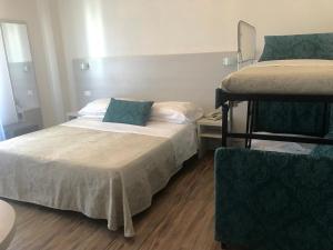 Letto o letti in una camera di Hotel Nelson