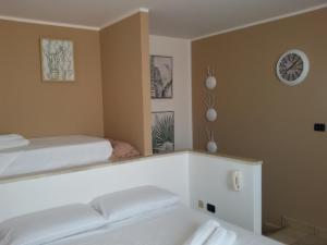 Ένα ή περισσότερα κρεβάτια σε δωμάτιο στο Casa Solarium