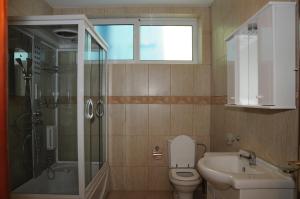 Koupelna v ubytování Apartments Dragišić