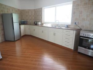 Kuchyň nebo kuchyňský kout v ubytování Cella Villa