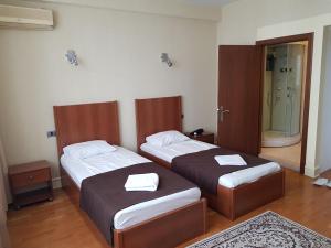 Krevet ili kreveti u jedinici u objektu Baku Sea View Hotel
