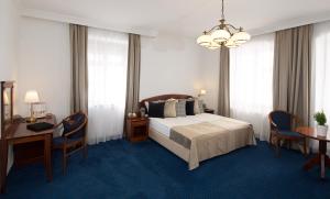 Postel nebo postele na pokoji v ubytování Fonte Hotel