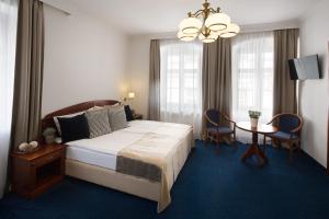 Postel nebo postele na pokoji v ubytování Fonte Hotel