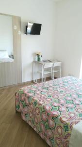 Postel nebo postele na pokoji v ubytování B&b Il sogno