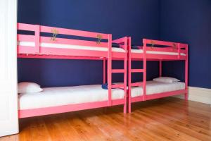 Postel nebo postele na pokoji v ubytování La Palma Hostel Leiria