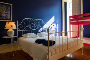 Postel nebo postele na pokoji v ubytování La Palma Hostel Leiria