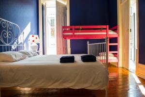 Postel nebo postele na pokoji v ubytování La Palma Hostel Leiria + 37 fotografií