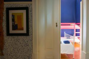 Postel nebo postele na pokoji v ubytování La Palma Hostel Leiria